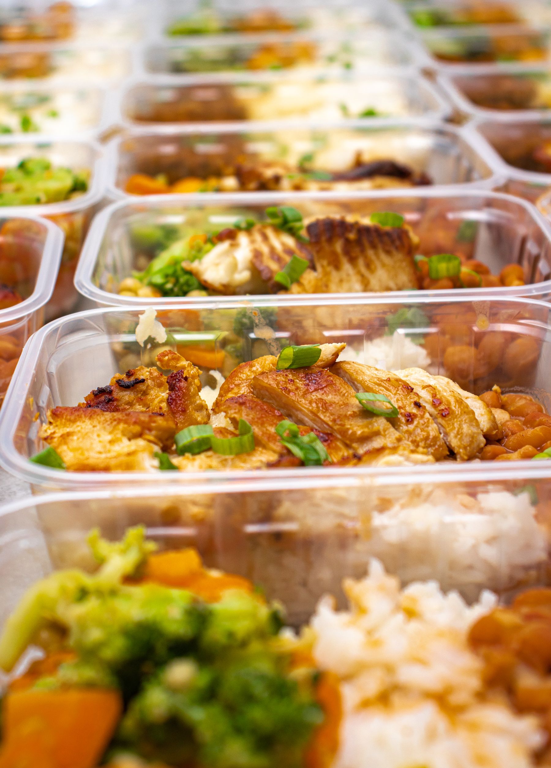 Prepared balanced meals with chicken, vegetables, and rice